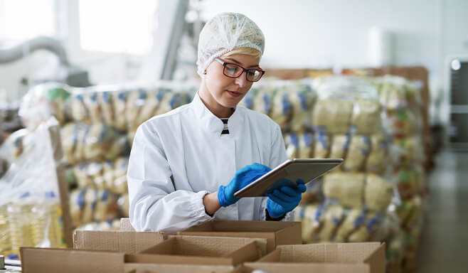 Female reviewing inventory